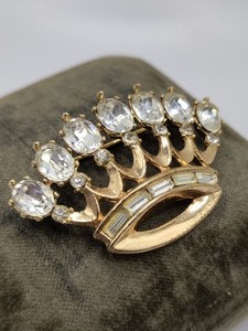 Vintage costume jewelry brooch with rhinestones