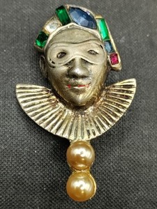 Harlequin jester face brooch with colored stones and pearl drops