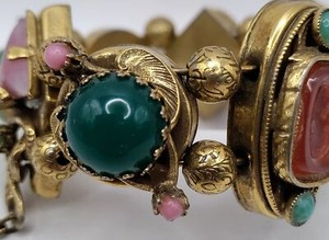 Gold bracelet with cabochons